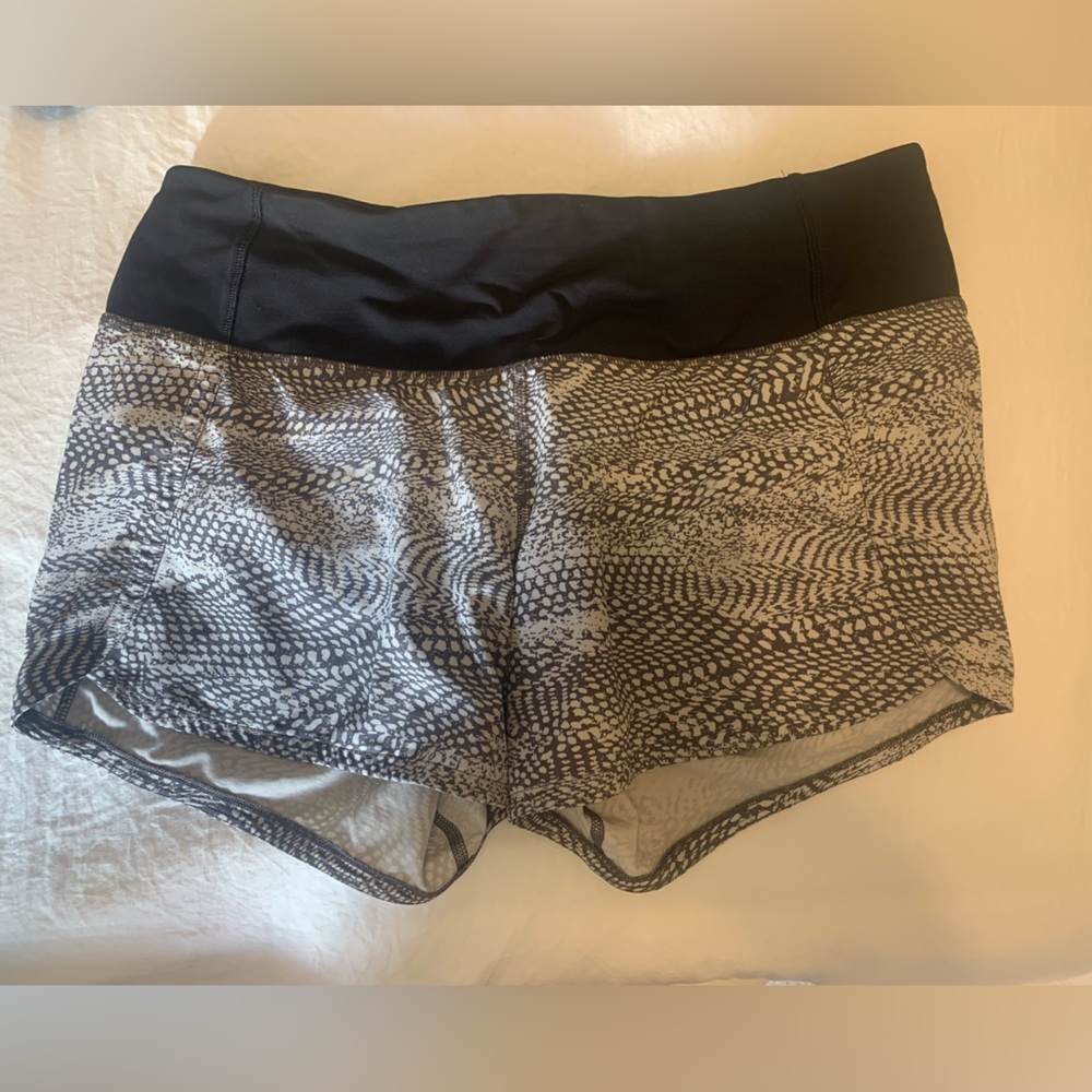 Lulu lemon hotty hot shorts size 4. With back zipper pocket.